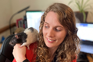Vikki Neville with rat sitting on her shoulder
